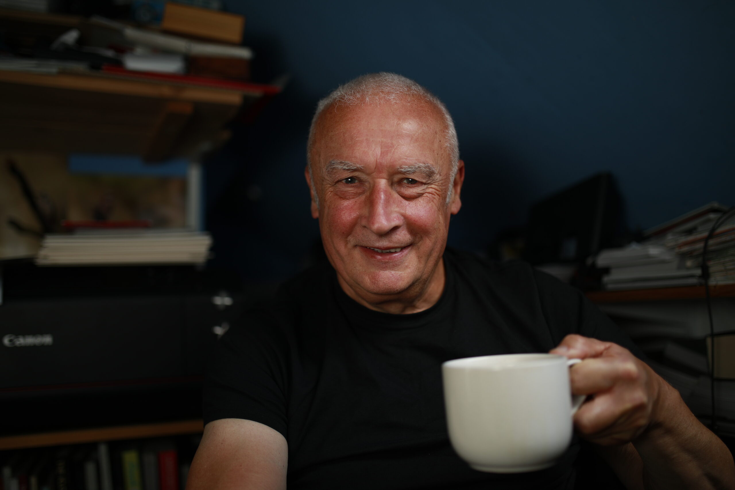 me in black with a cup of tea